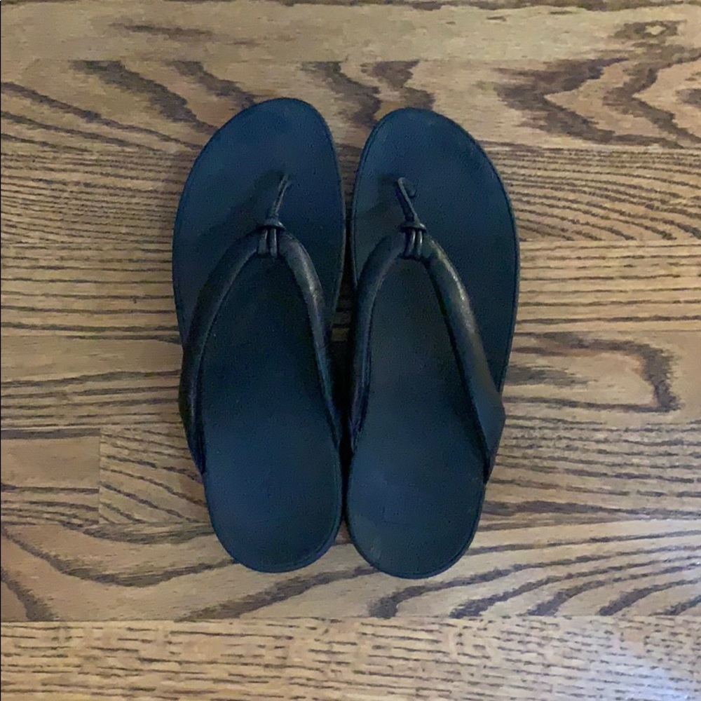 FITFLOP brand flip flops.
